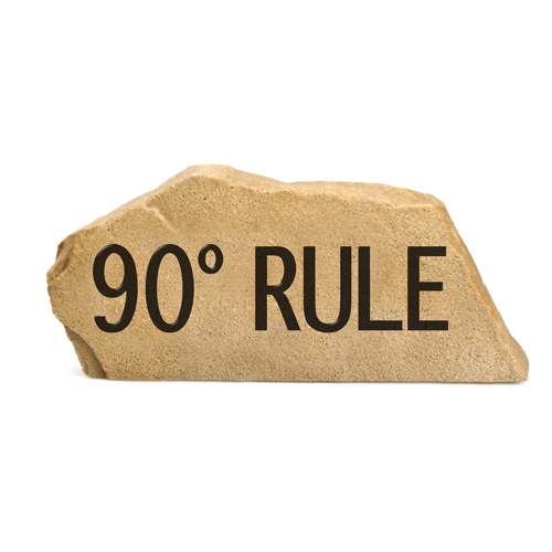 Direction sign - "90 rule" - sandstone
